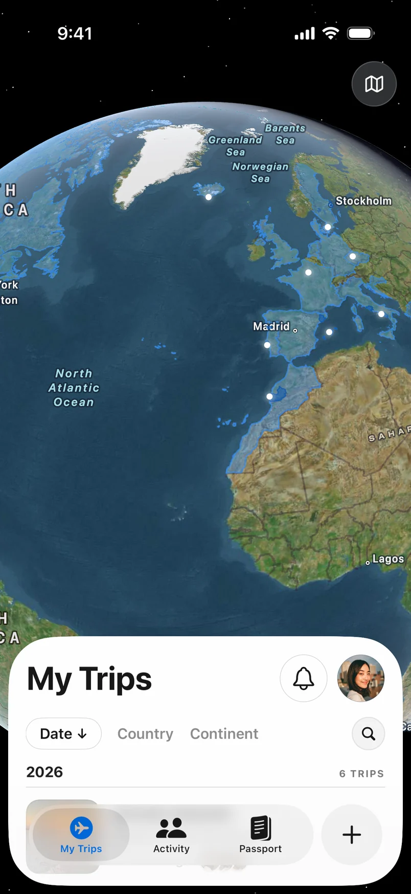 The home globe with visited places lit across the North Atlantic